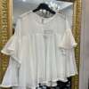 Blusa con volant Bianca